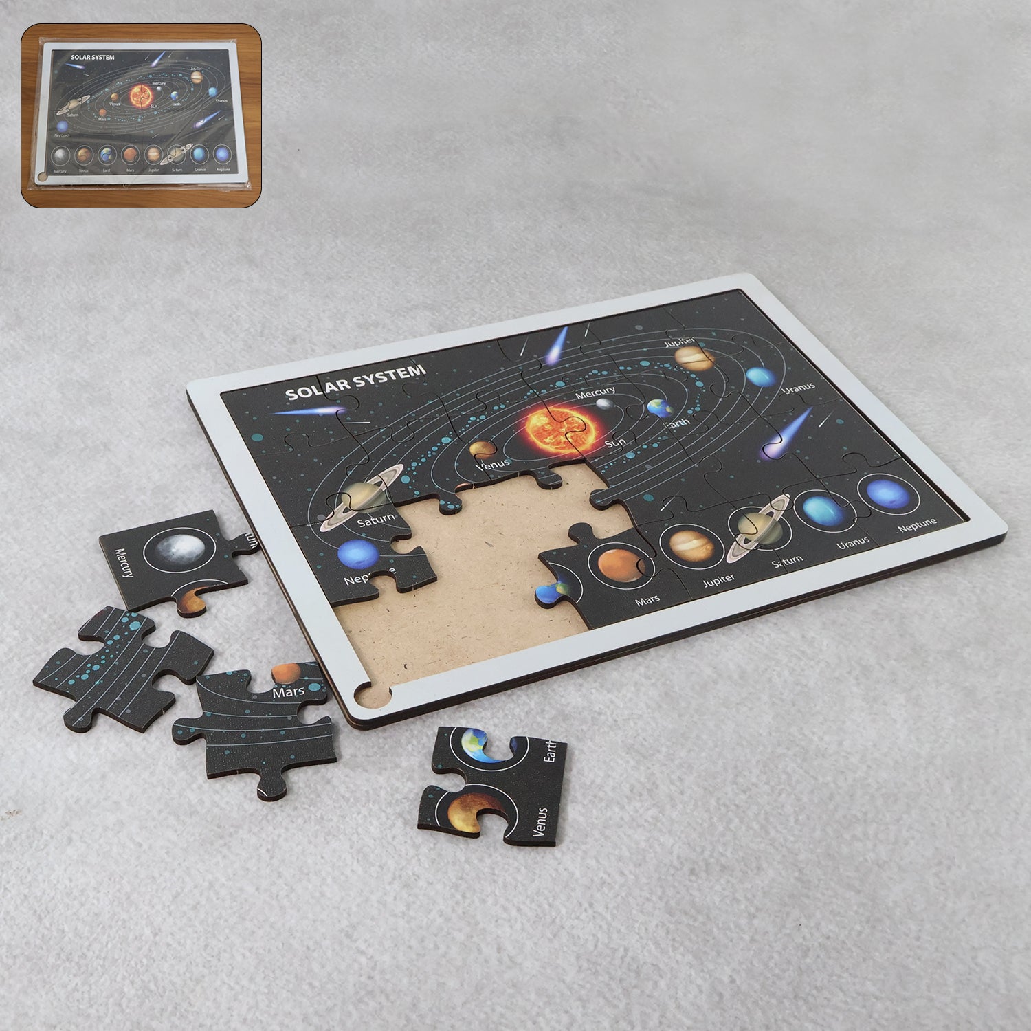 Top view of wooden puzzle board layout with colorful peg pieces