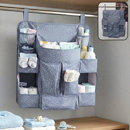 Hanging baby organizer with multiple pockets for diapers and clothes