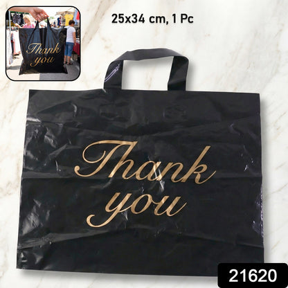 Side view of reusable Thank You printed carry bag for shopping and gifts