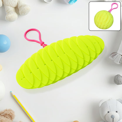 Foldable worm fidget toy held in hand, demonstrating flexibility