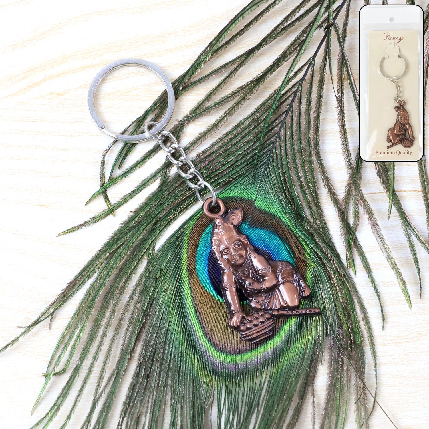 Bal Krishna keychain in crawling pose made from durable metal