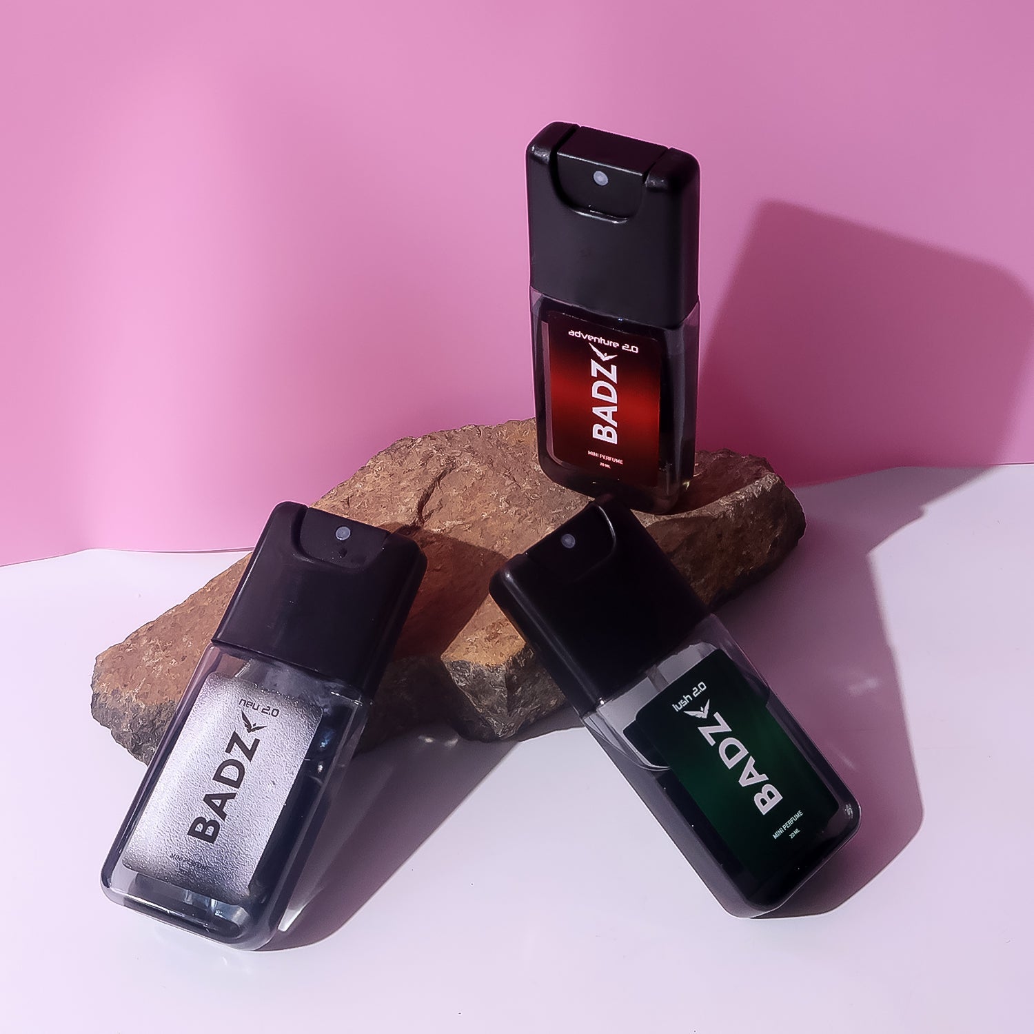 Sleek mixed fragrance bottles in travel spray format for easy application