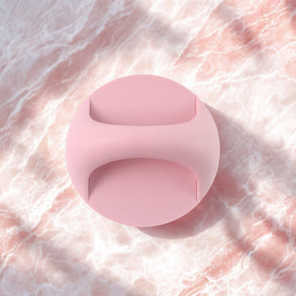 Self-adhesive plastic handle grip displayed on white background