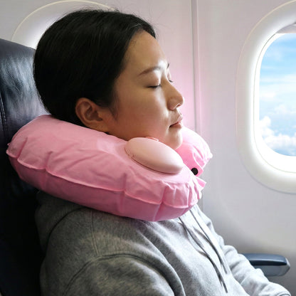 Side view of inflatable travel neck pillow showing manual air valve