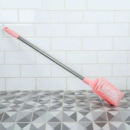 Angled shot of long handle toilet cleaning brush designed for bathroom use