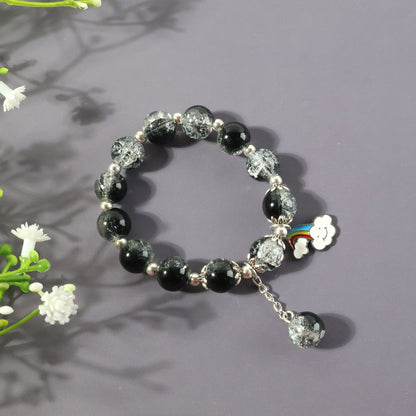 Black and crystal beaded charm bracelet with cloud and rainbow charm