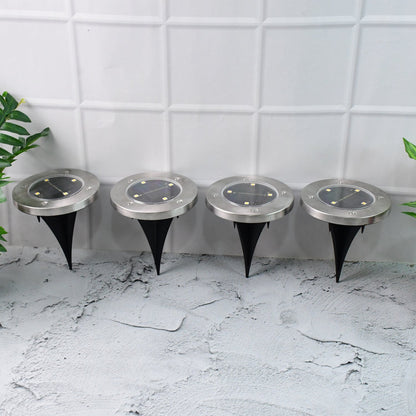 Set of 4 solar powered LED garden lights with stainless steel body and ground spikes