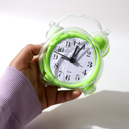 Side view of bright green transparent quartz analog alarm clock