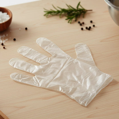 Transparent disposable gloves fitted on hands for hygienic use