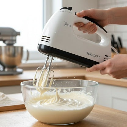 Stainless steel beaters included with electric hand mixer for effective mixing