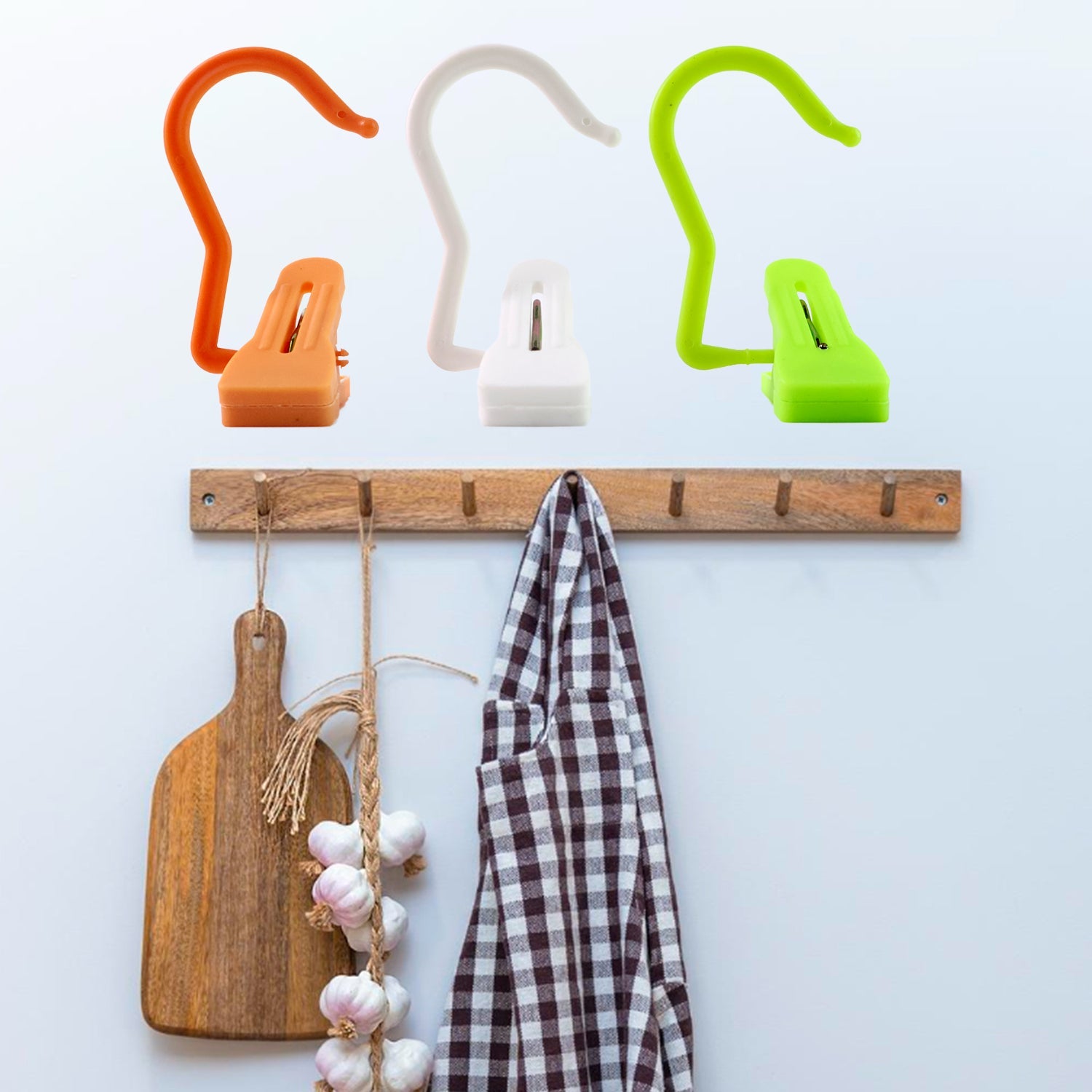 Hanging hook clip attached securely to a rod for hanging clothes