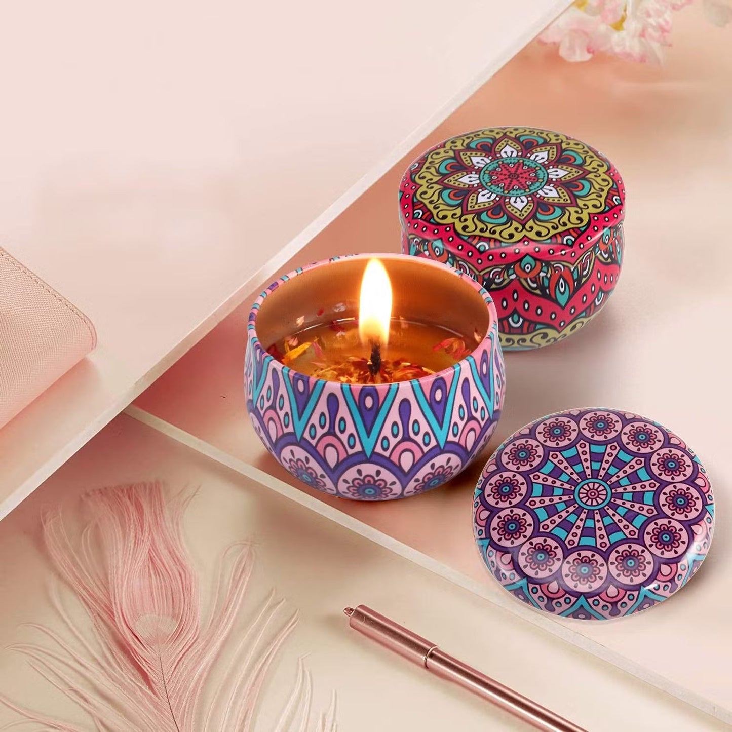 Metal candle jar featuring colorful mandala art design
