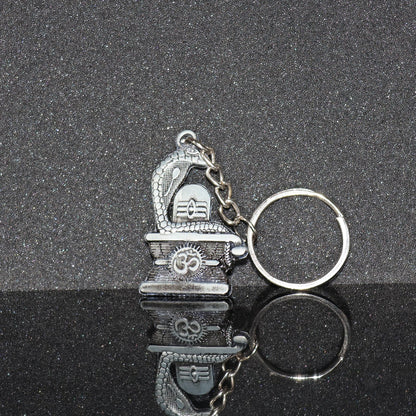 Elegant Shivling keychain with snake design in silver metal