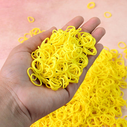 Bright orange elastic rubber bands bundled together