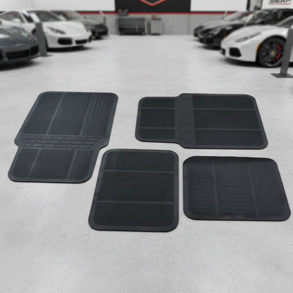 Universal vehicle floor protection mats in black rubber