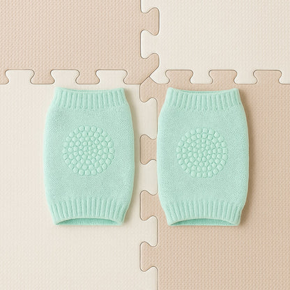Close-up of soft mint green wool toddler knee protector leg warmers