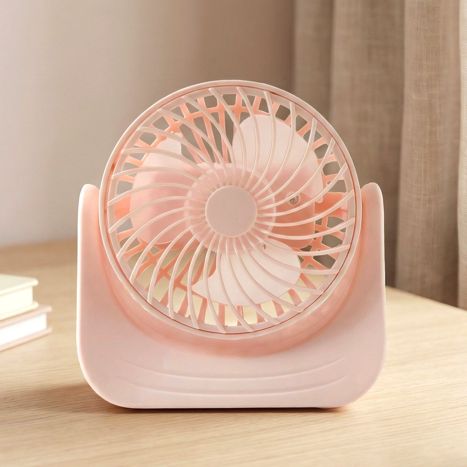 Close-up of silent mini desk fan base and power button controls