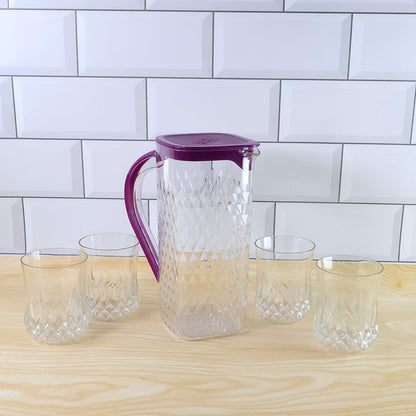 Side view of BPA-free plastic jug and glasses combo set with easy pour design