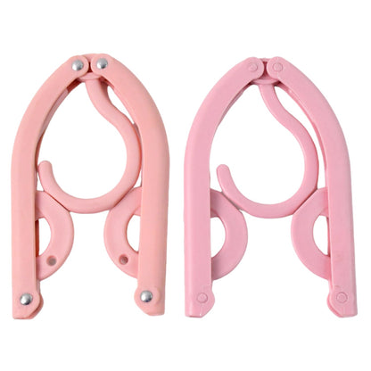 Compact portable hanger small enough to carry in travel bag