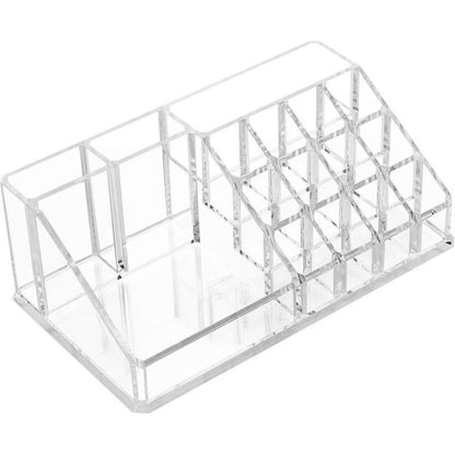 Acrylic makeup organizer box on vanity table with cosmetics inside