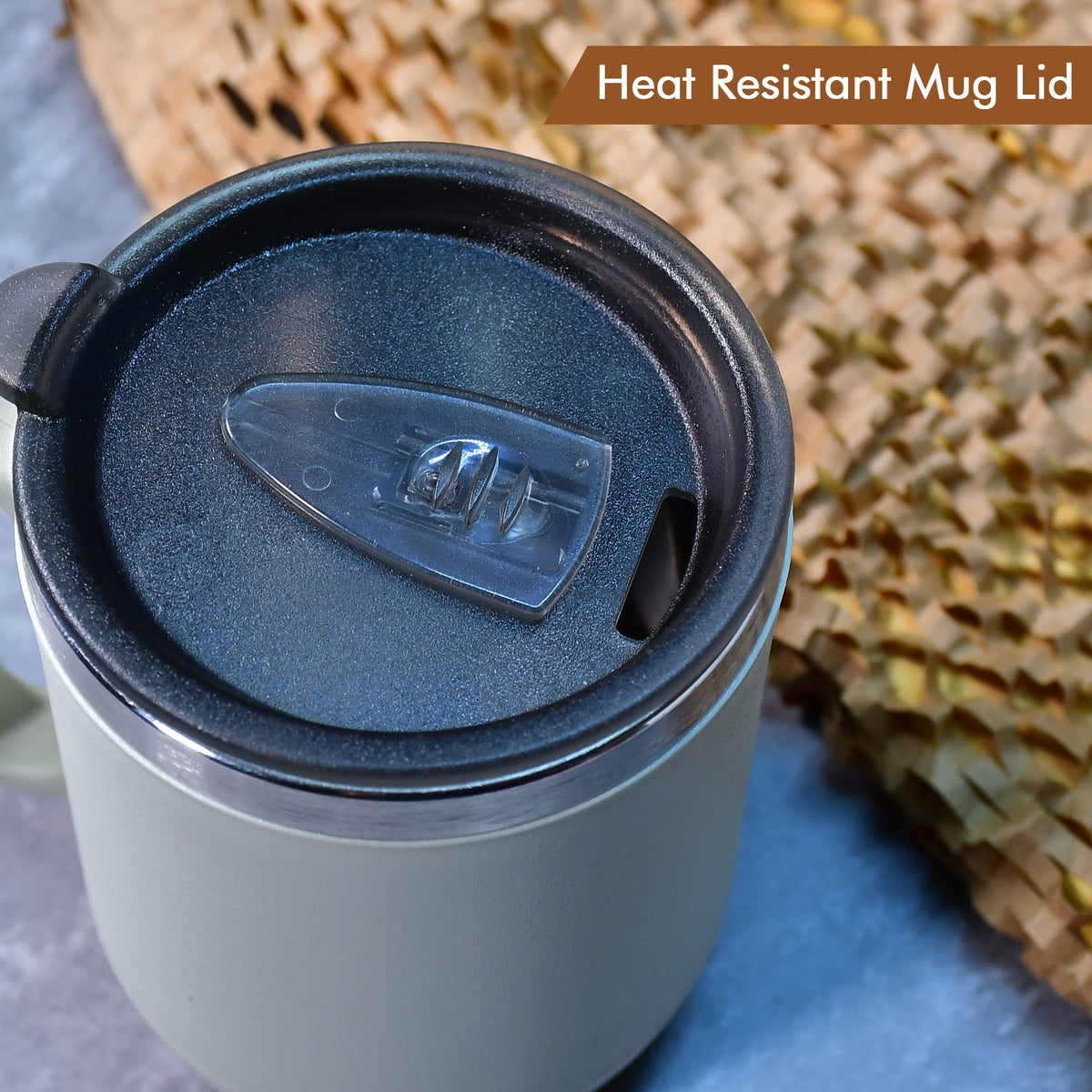 A close-up of the heat-resistant lid on the Ganesh 400ml coffee mug.