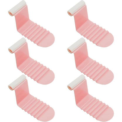 Anti-slip ribbed design bed sheet clips in use for secure sheet hold