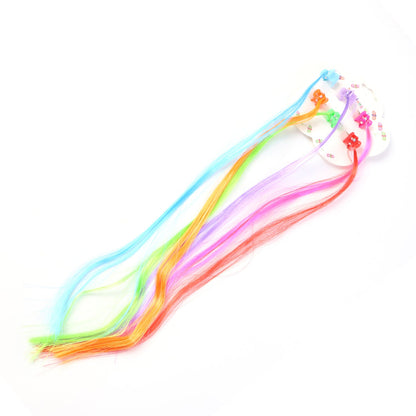 Kids hair extensions showing bright mix-color hair streaks with clips