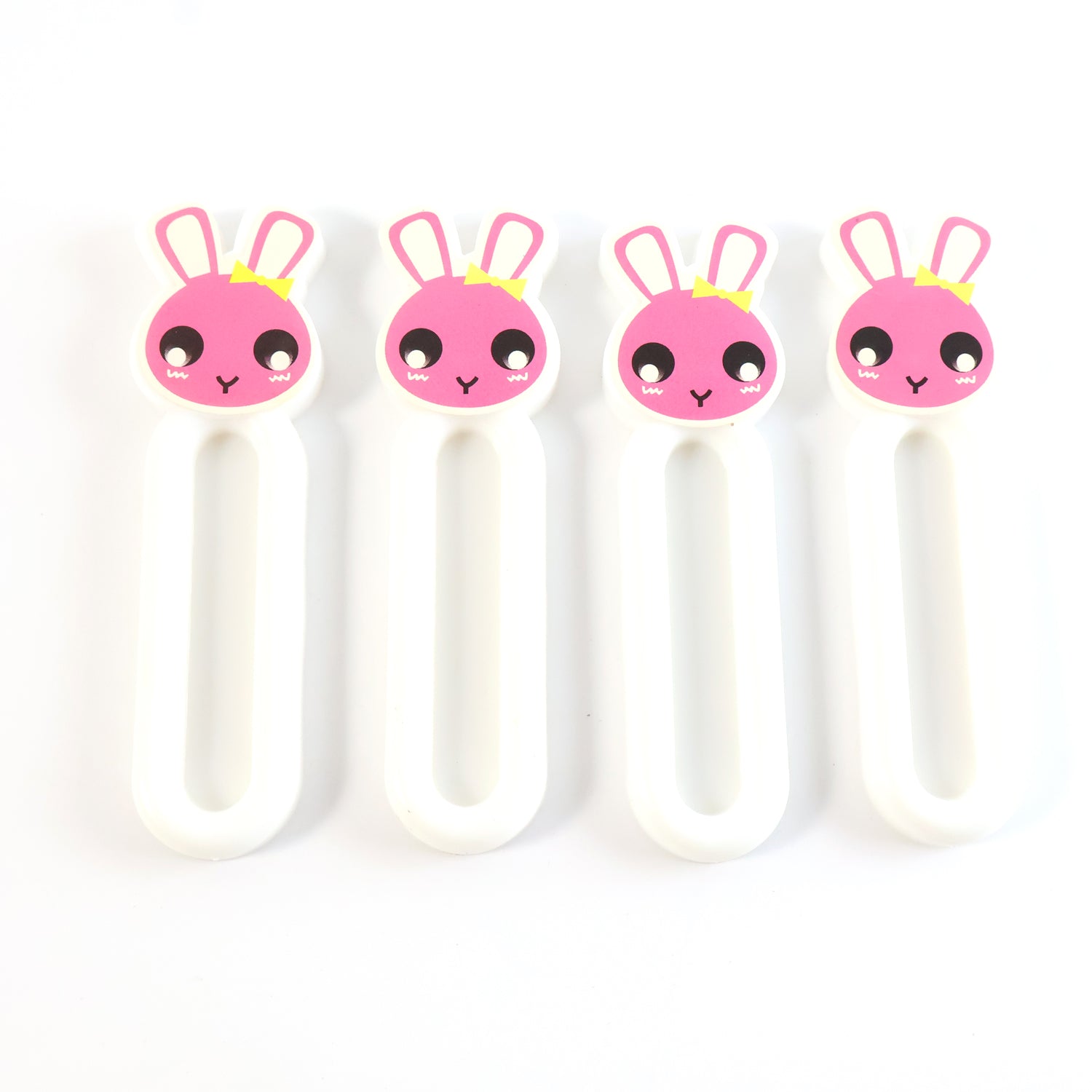 Pull handles mounted on cabinet doors using self stick push pull helper set