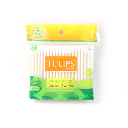 Cotton swabs with paper sticks arranged neatly on flat surface