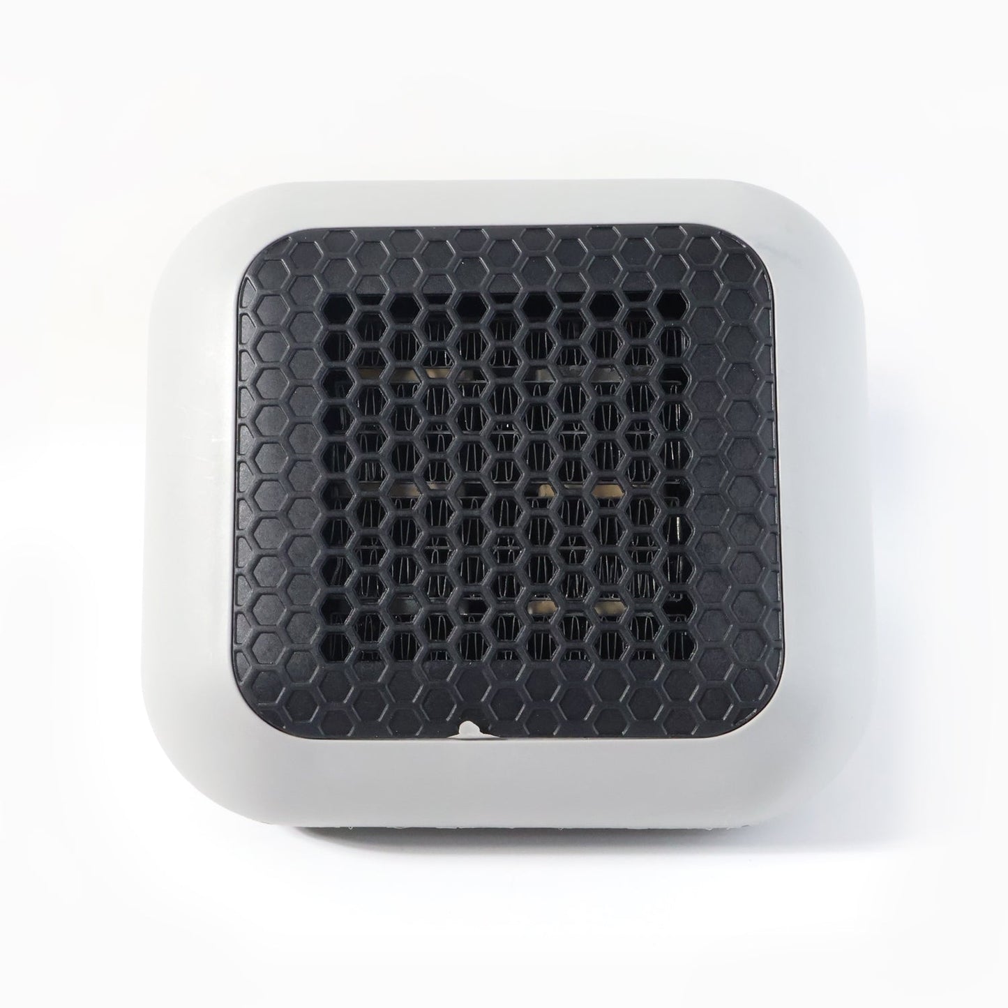 Small room warmed by the compact 600W plug-in wall-mounted room heater