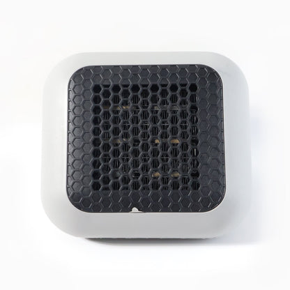 Small room warmed by the compact 600W plug-in wall-mounted room heater