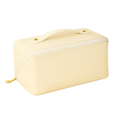 Beige toiletry and makeup pouch with zipper ideal for travel storage