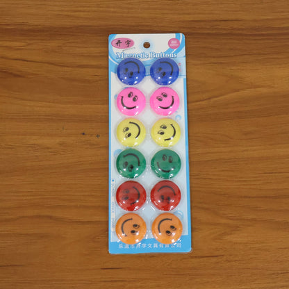 Multicolored smiley face magnetic buttons arranged in set