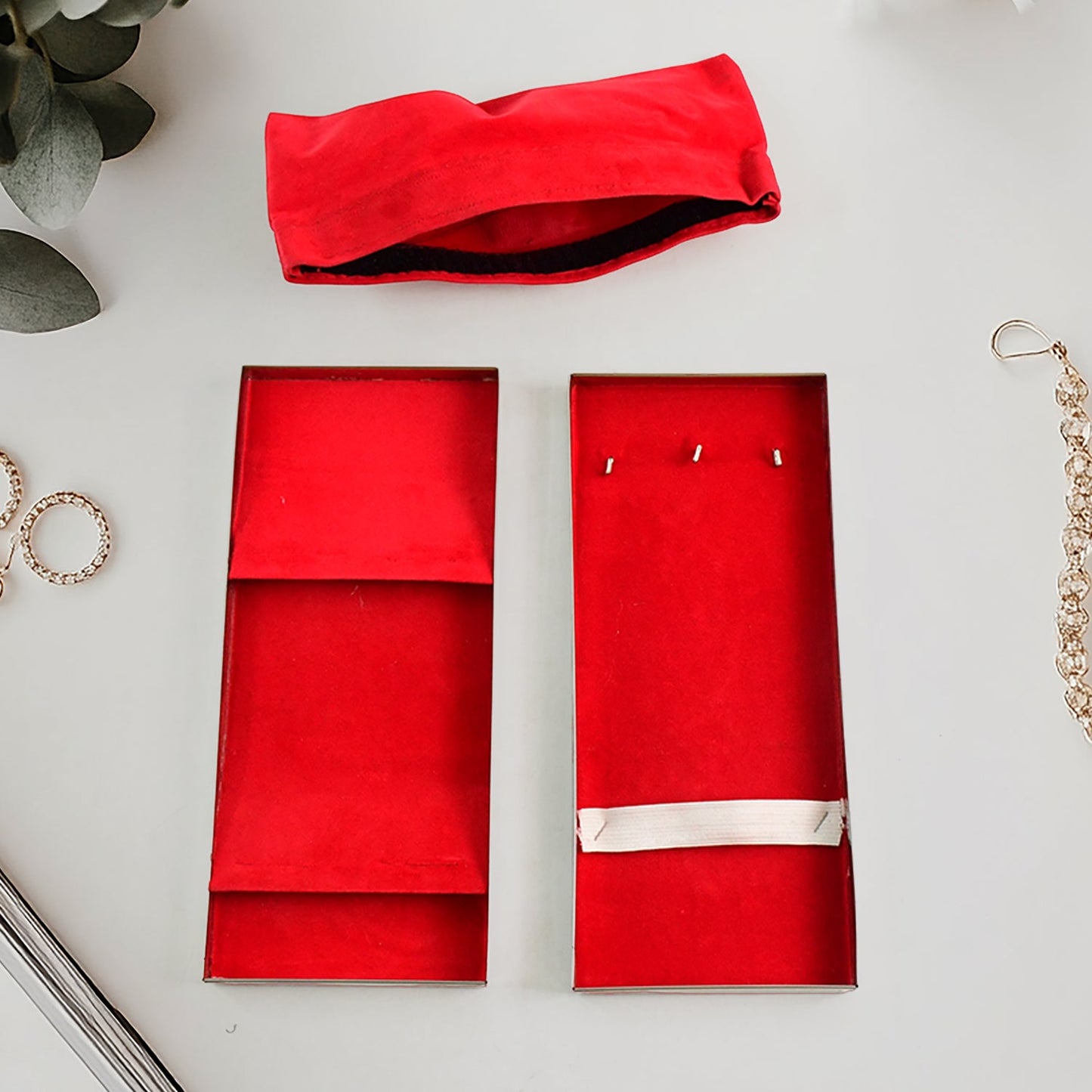 Close-up of the red velvet compartments within the lockable Jewellery Storage Box, ideal for organisation.