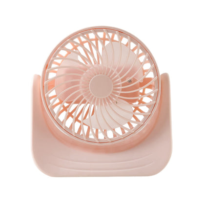 User enjoying cooling from silent mini desktop fan at workspace