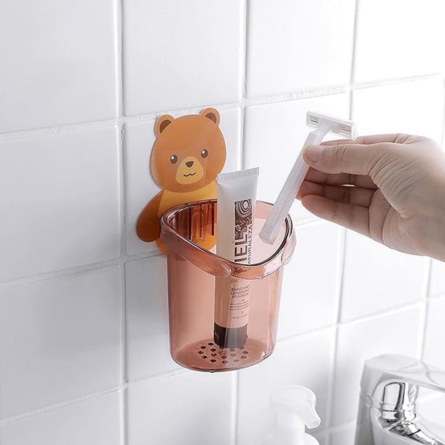 Brightly colored teddy bear toothbrush holder for children
