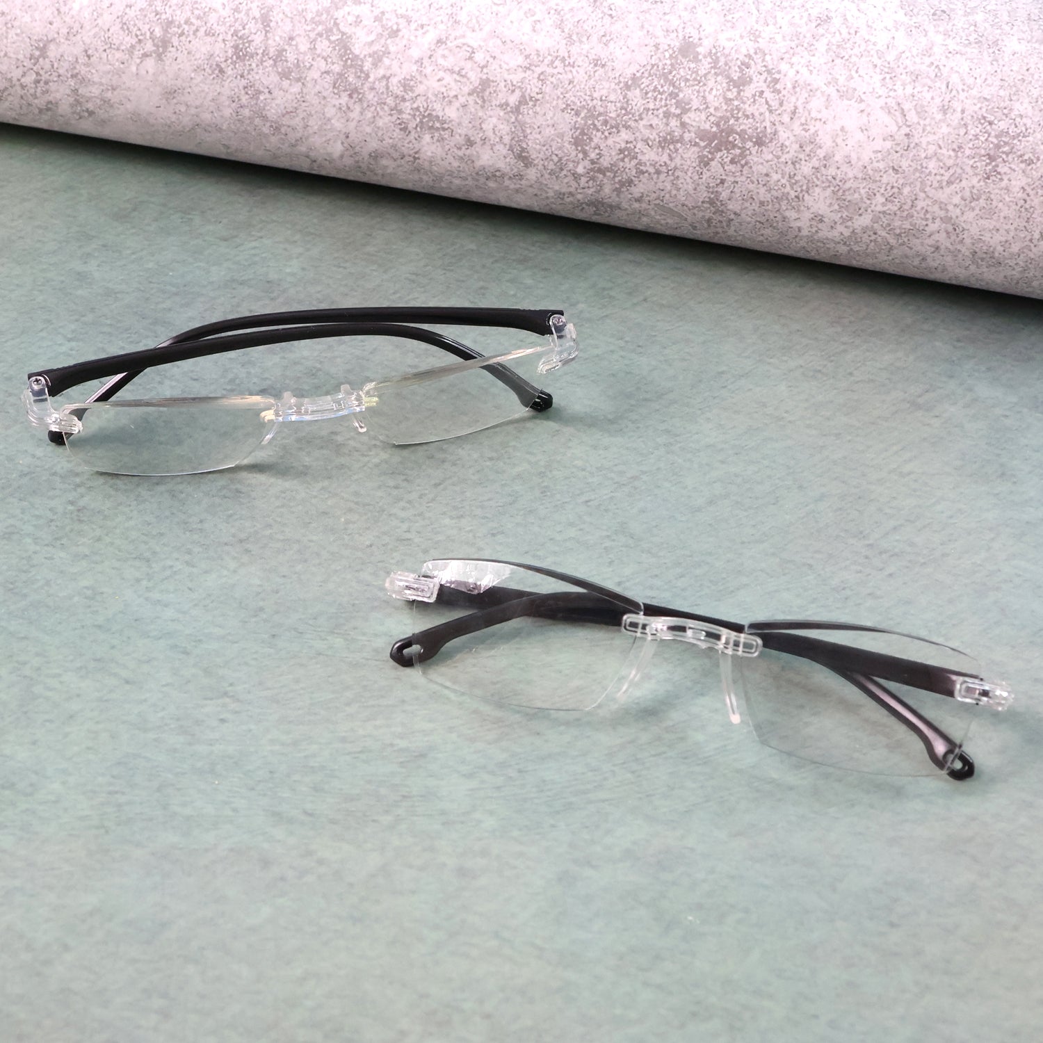 Protective case storing lightweight rimless reading glasses for travel
