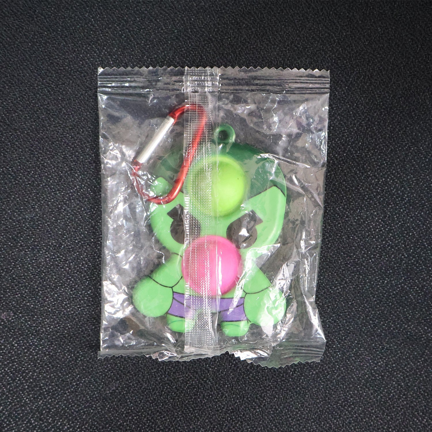 Silicone Pop It fidget toy with portable keychain clip for on-the-go use