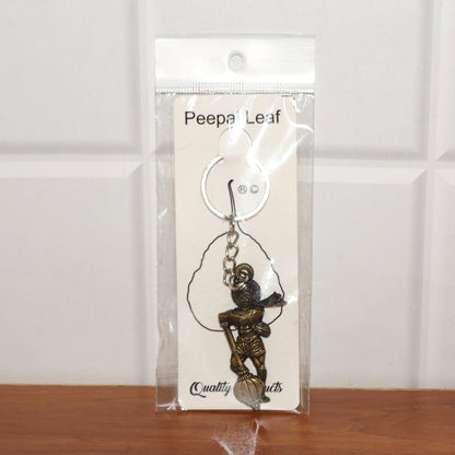 Lord Hanuman metal keychain packaged in Peepal leaf blister pack