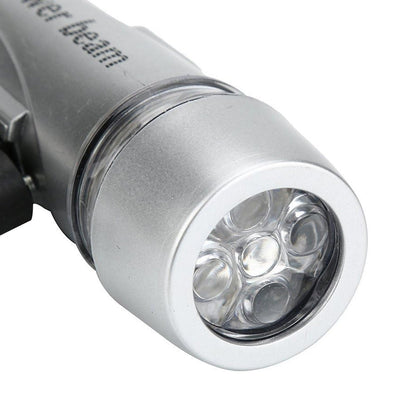 Bicycle headlight emitting a wide glow, lighting up the road for safe cycling.