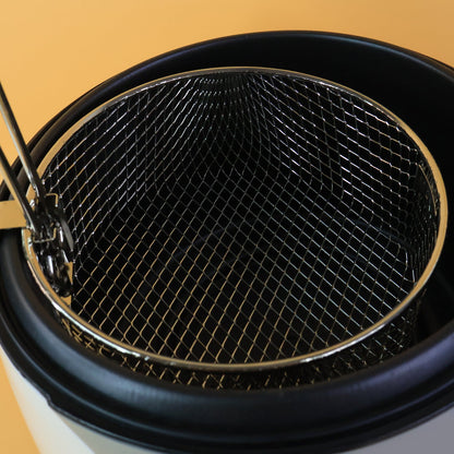 Compact stainless steel electric deep fryer in modern kitchen