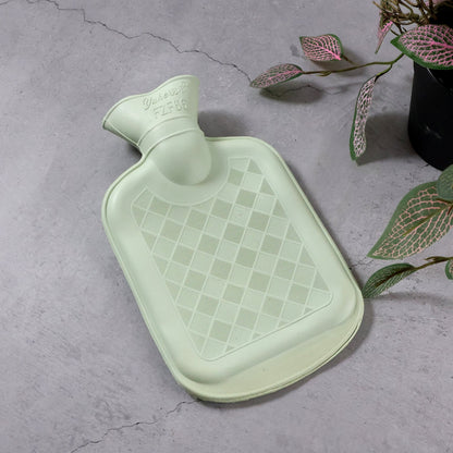 Green rubber hot water bag designed for comfortable pain and cramp relief