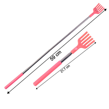 Person using the telescopic back scratcher to reach an itch on their back.