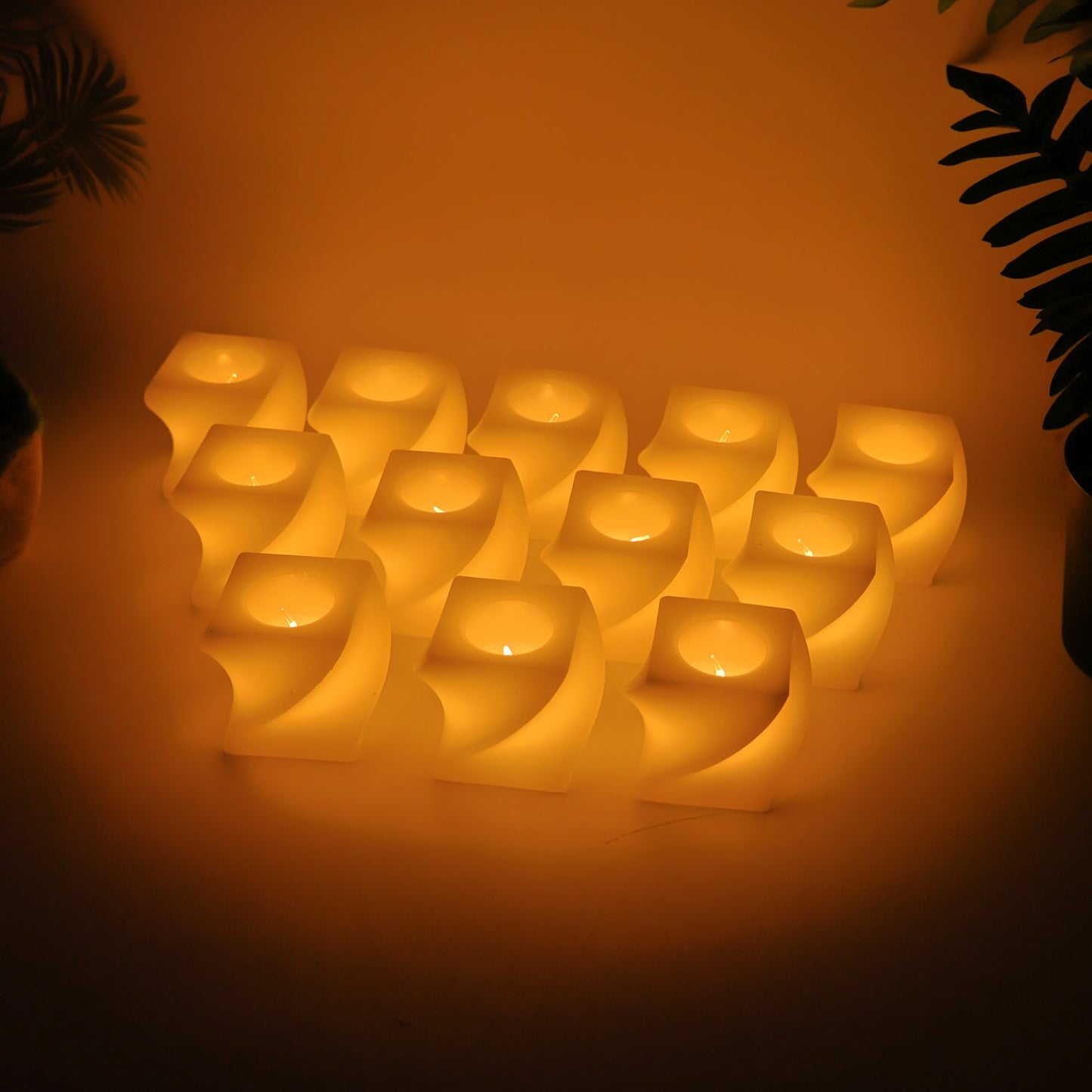 Decorative LED candles emitting warm white flickering light for cozy settings
