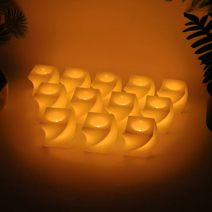 Decorative LED candles emitting warm white flickering light for cozy settings