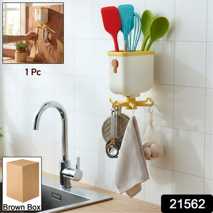 Sticky wall hook holding a kitchen towel for convenient storage