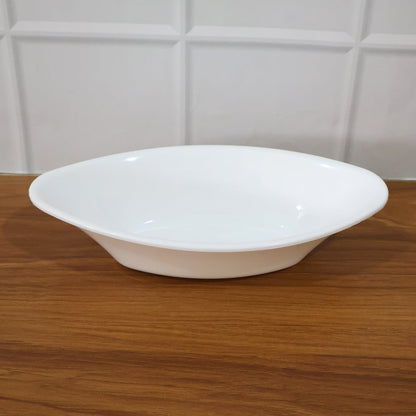 White Marin oval serving bowl measured with tape showing dimensions