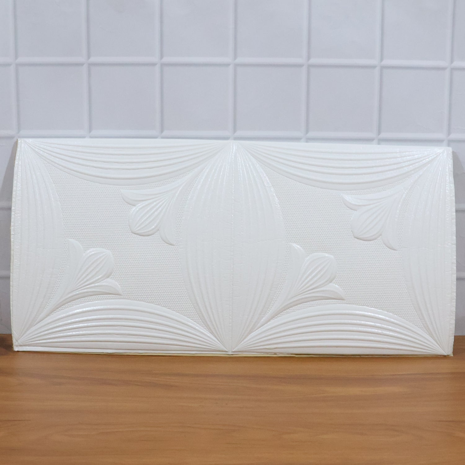 Textured white floral 3D foam wallpaper panel enhancing home interior aesthetics