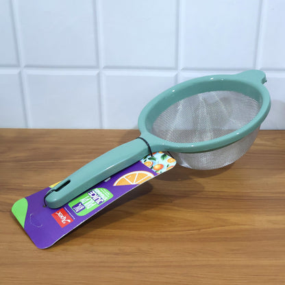 Easy-clean large kitchen strainer hanging securely by handle on kitchen hook