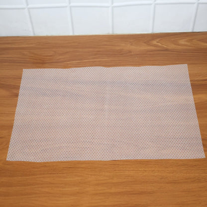 Close-up shot showing the textured surface of the refrigerator mat